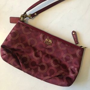 Coach clutch bag with wrist handle